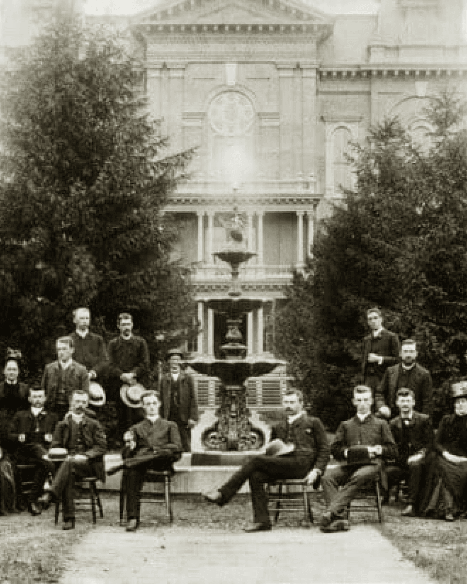 black and white old photo of people sitting